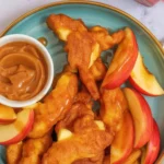Crispy Air Fryer Apple Fries with cinnamon-sugar coating and caramel dip