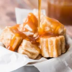 Delicious Sweet Air Fryer Churro Bites Recipe coated in cinnamon sugar